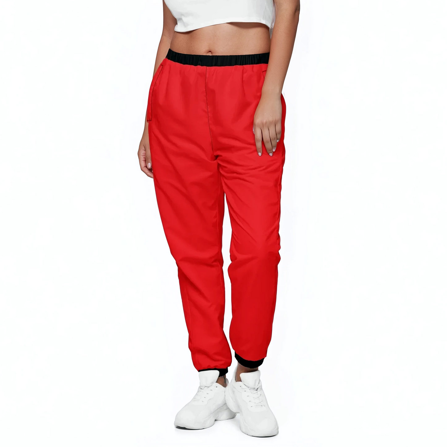 Red Edition Track Pants: Close-up of elastic waistband and ankle cuffs, highlighting mesh lining.