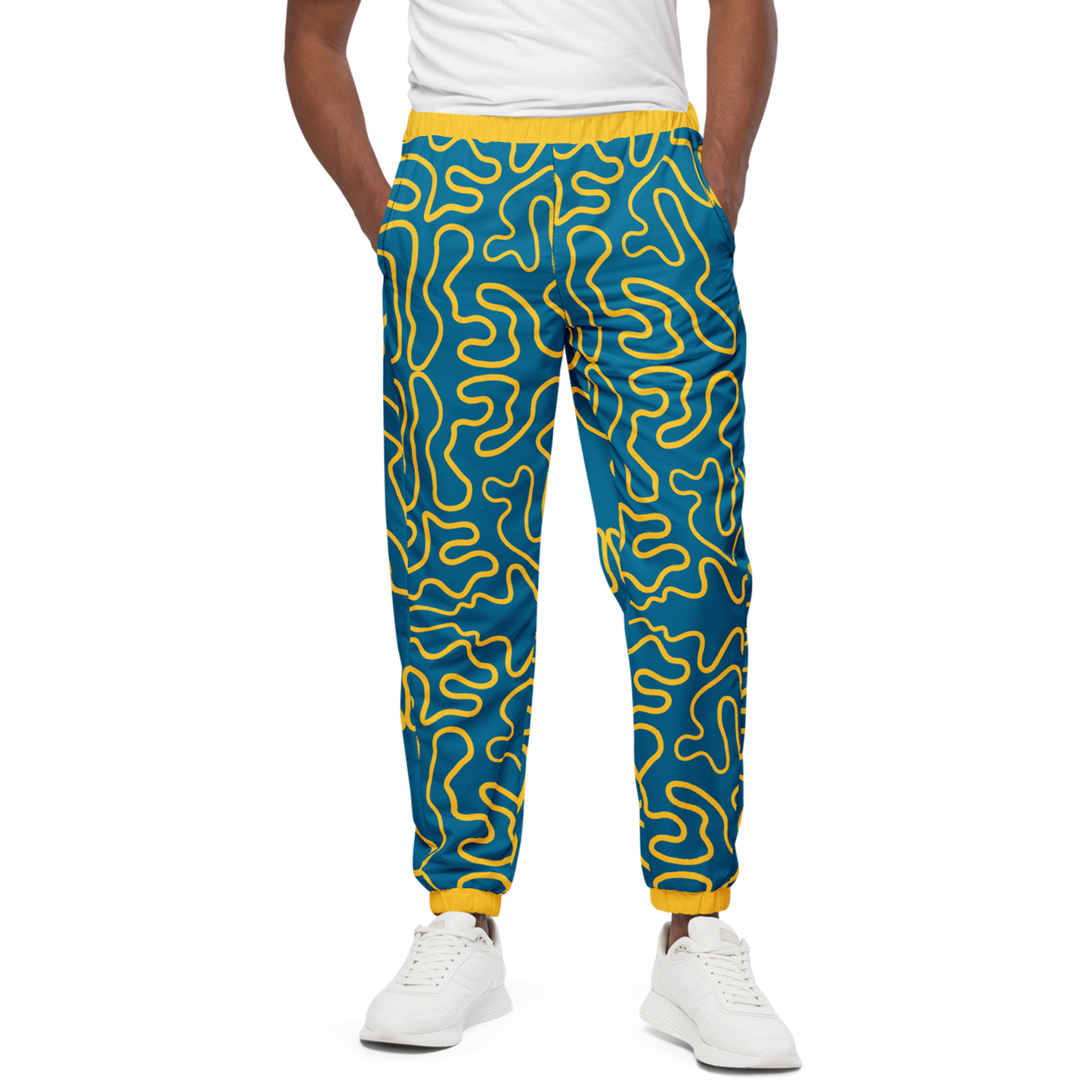 Wavy Line Track Pants with elastic ankle cuffs showcasing sneakers.