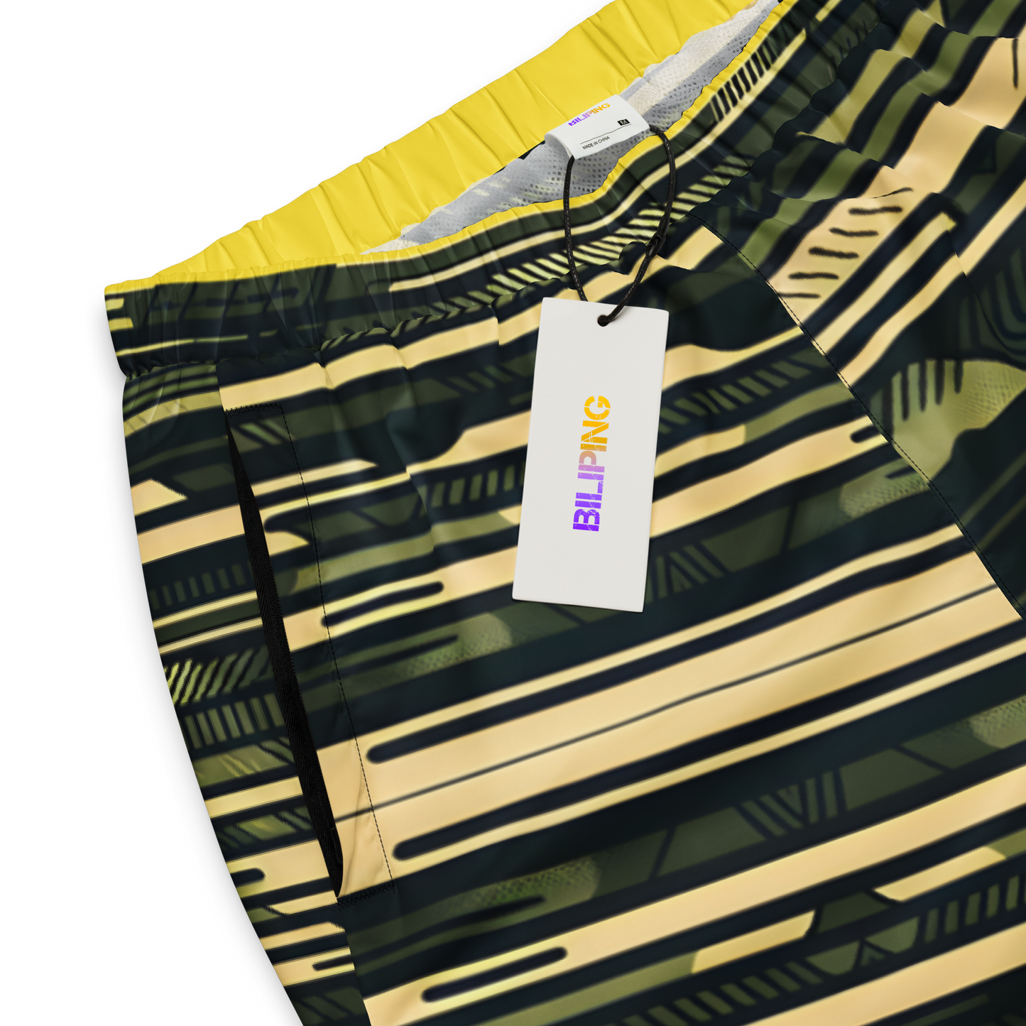 Camo Style Track Pants with tag, showcasing elastic ankle cuffs.