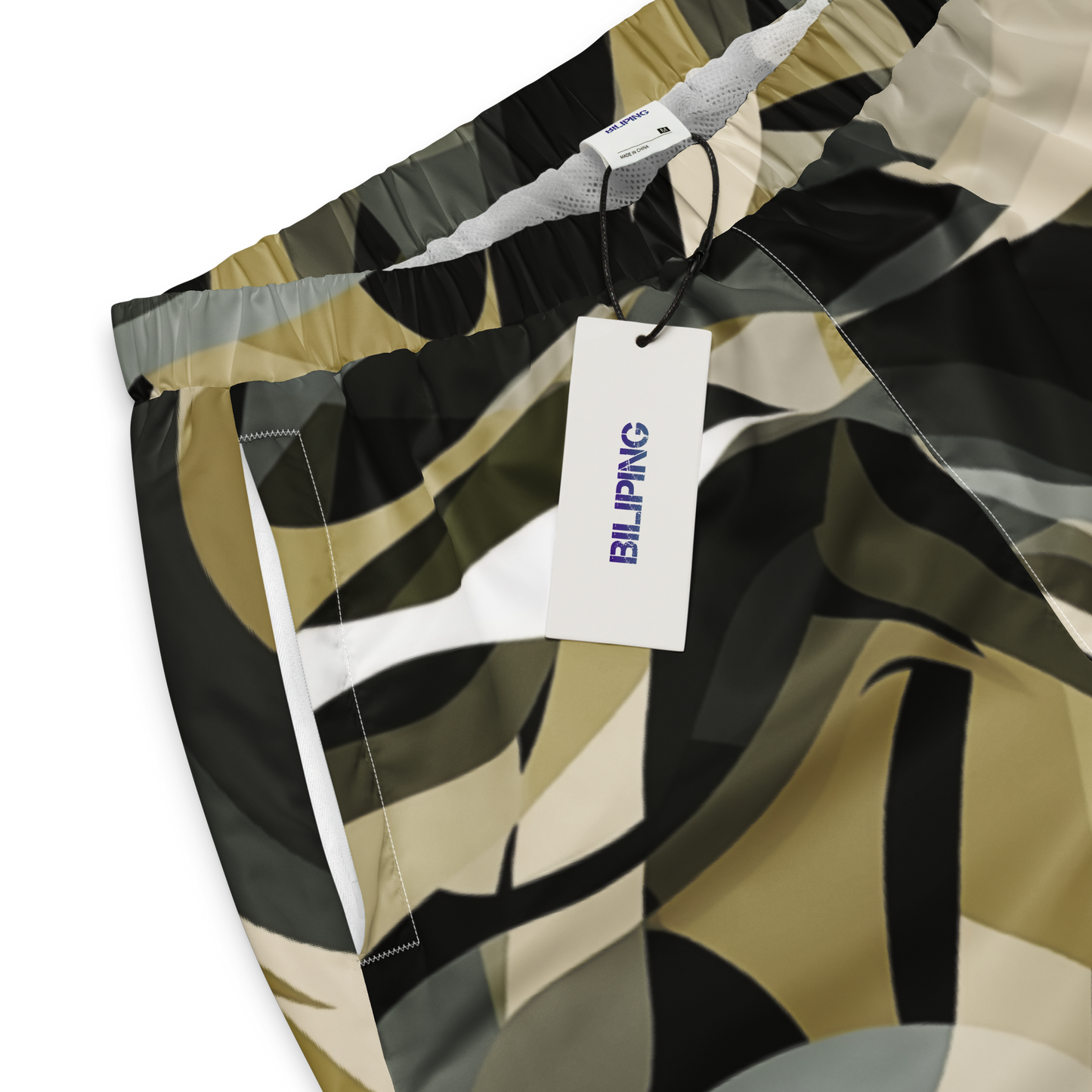 LZ Pants: Unisex track pants with tag, elastic cuffs, and mesh lining.