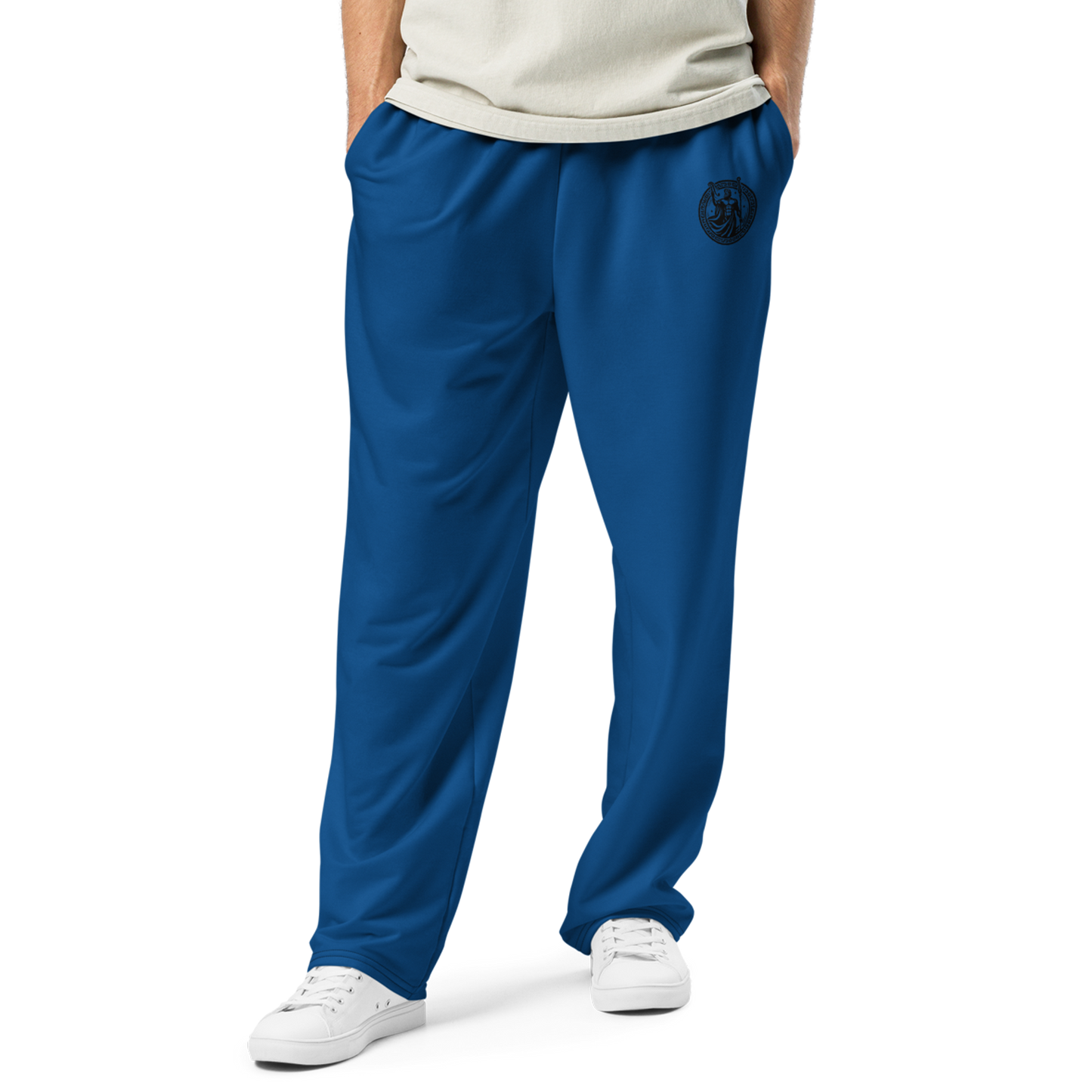 Loose-Fit Joggers close-up; wide-leg, smooth fabric, deep side pocket visible.