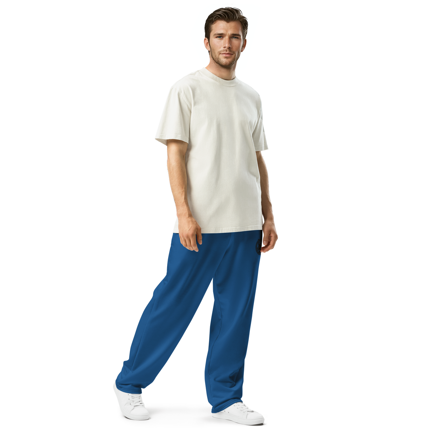 Loose-Fit Joggers with wide-leg design, worn by a standing man.