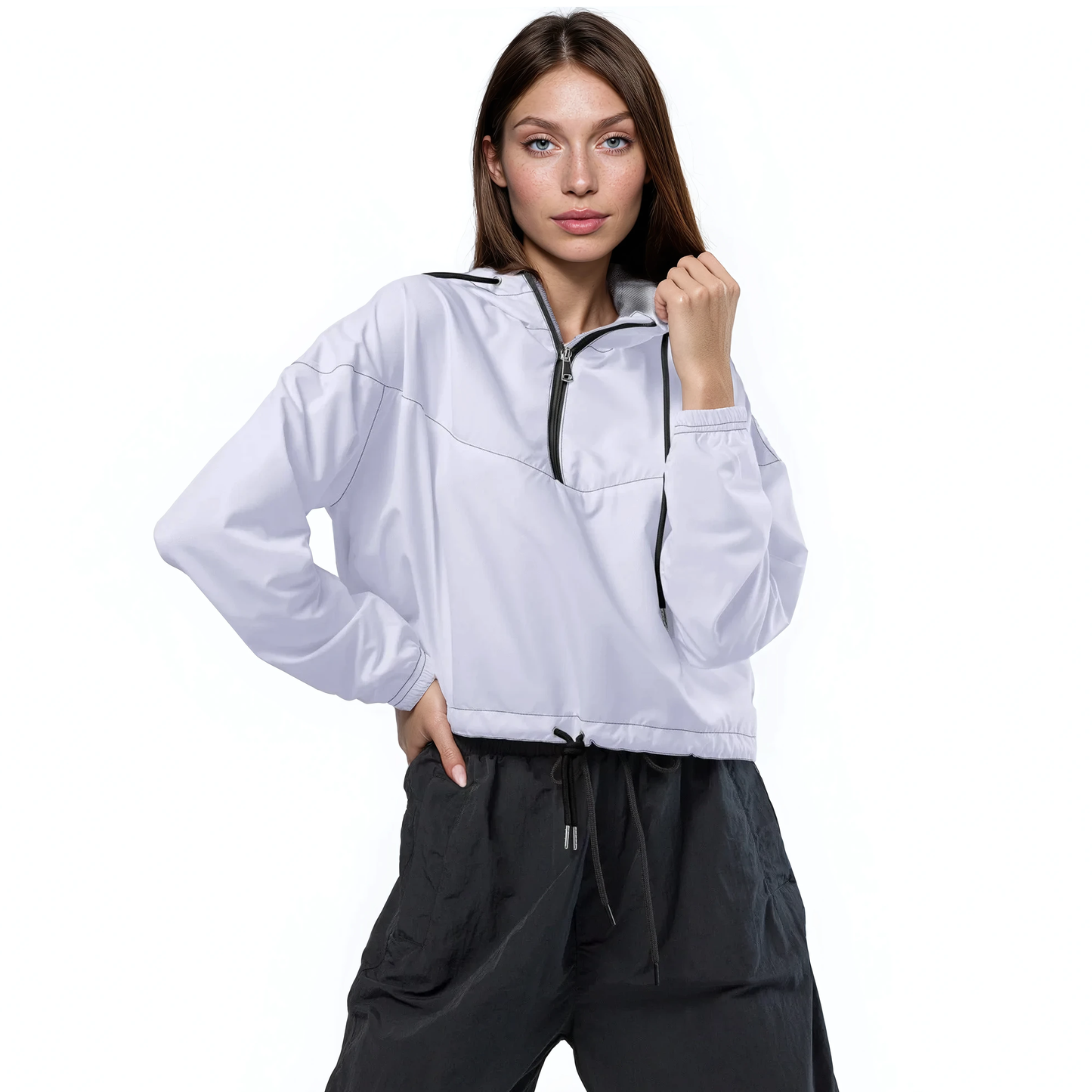 Woman models Lilac Loop Windbreaker, showcasing its adjustable drawcords and side-slit pockets.