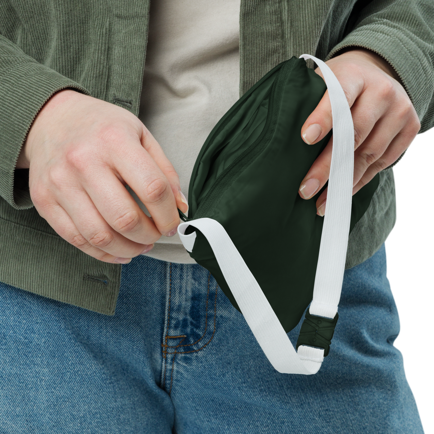 Close-up of a hand adjusting the True Nature Windbreaker’s elastic cuff.