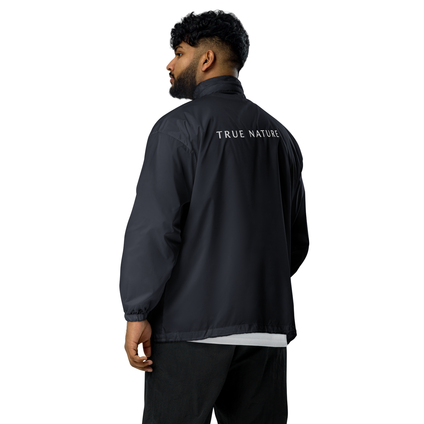 True Nature Windbreaker close-up; lightweight, water-repellent, drawstring hood, zip-up front.