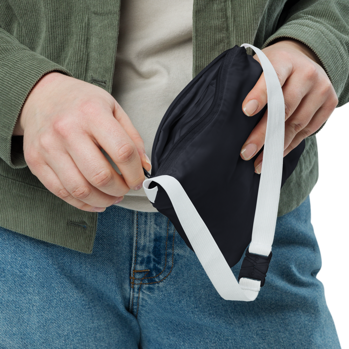 True Nature Windbreaker with zipped pocket and elastic cuffs, close-up view.