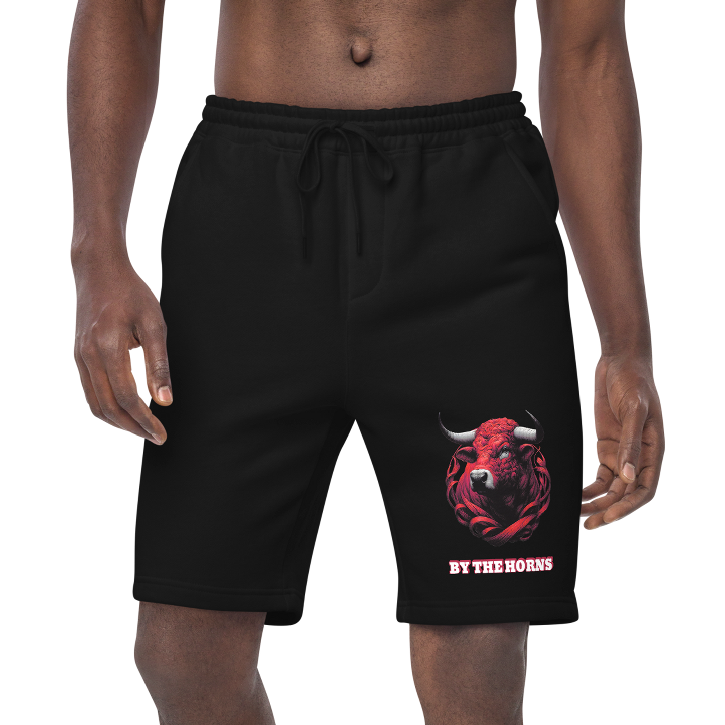 Men's Fleece Shorts: Close-up of man in black shorts, hand in pocket.