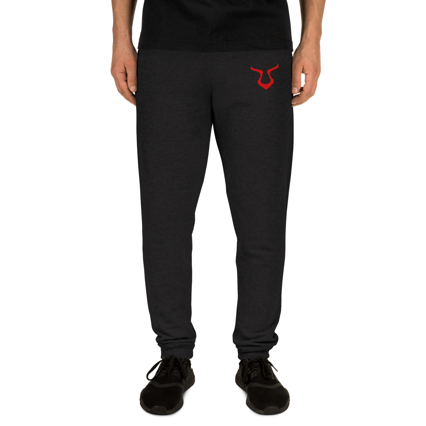 V - Joggers close-up with red logo, showcasing sleek tapered fit.