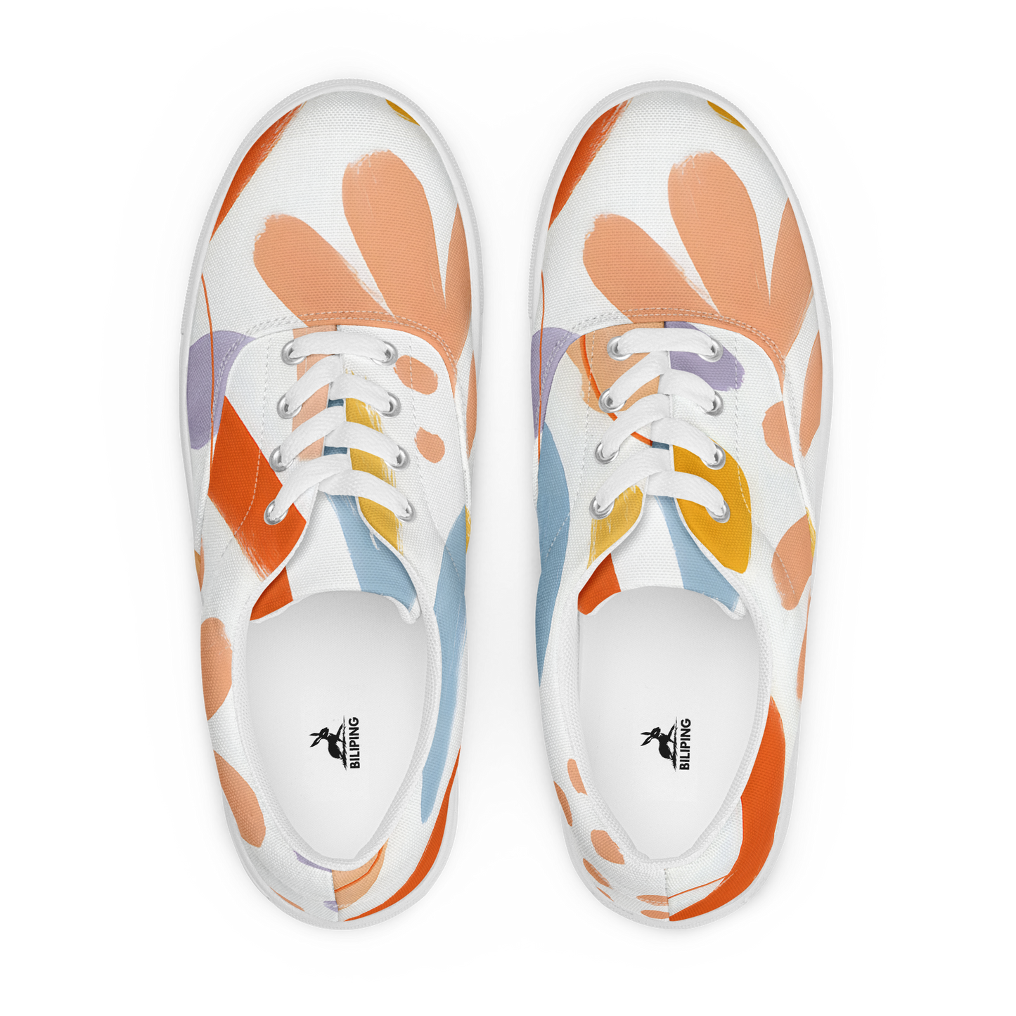 Artful Dabs women's lace-up canvas sneakers, close-up, showcasing sleek design.