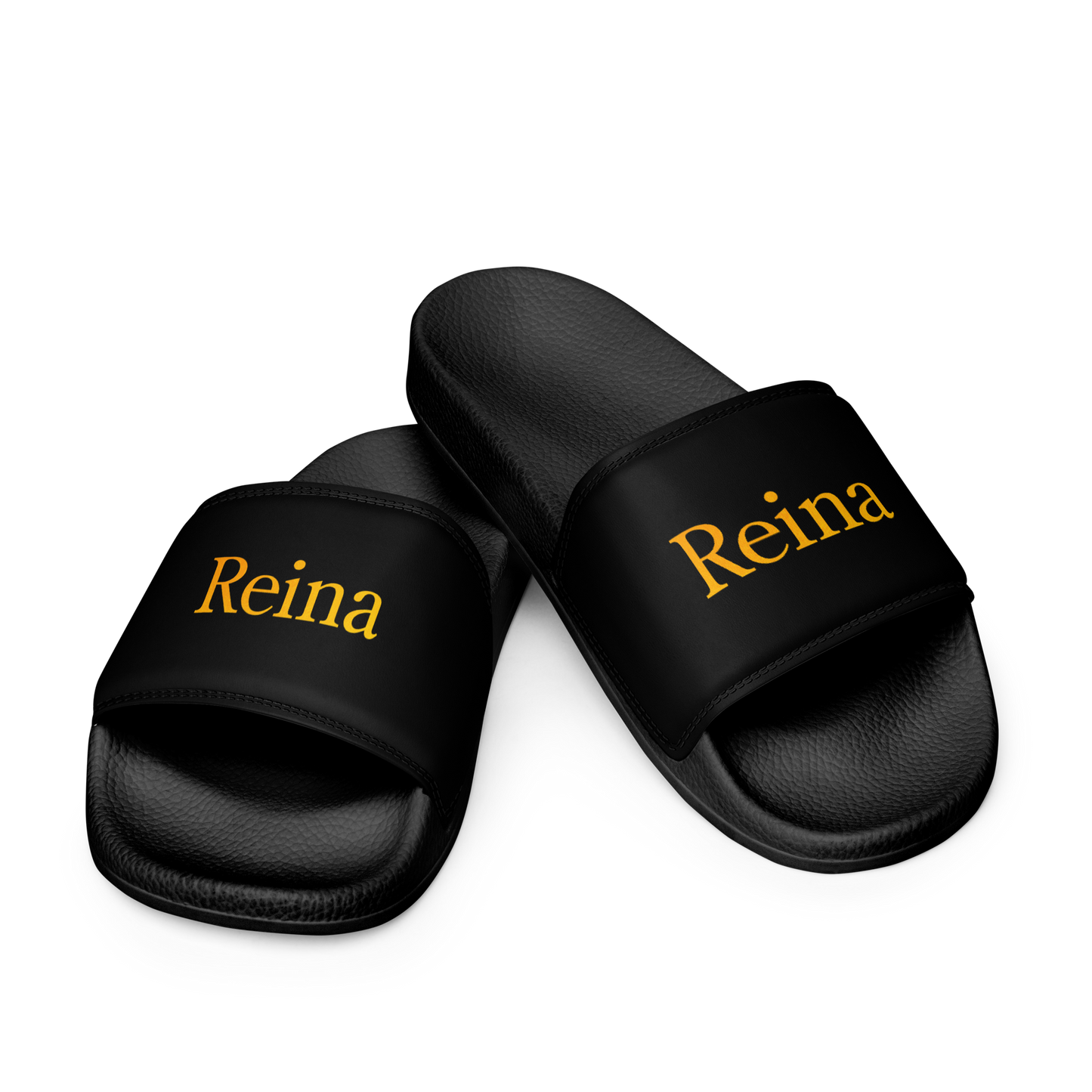 Reina black sandals with yellow text, featuring cushioned faux leather strap.