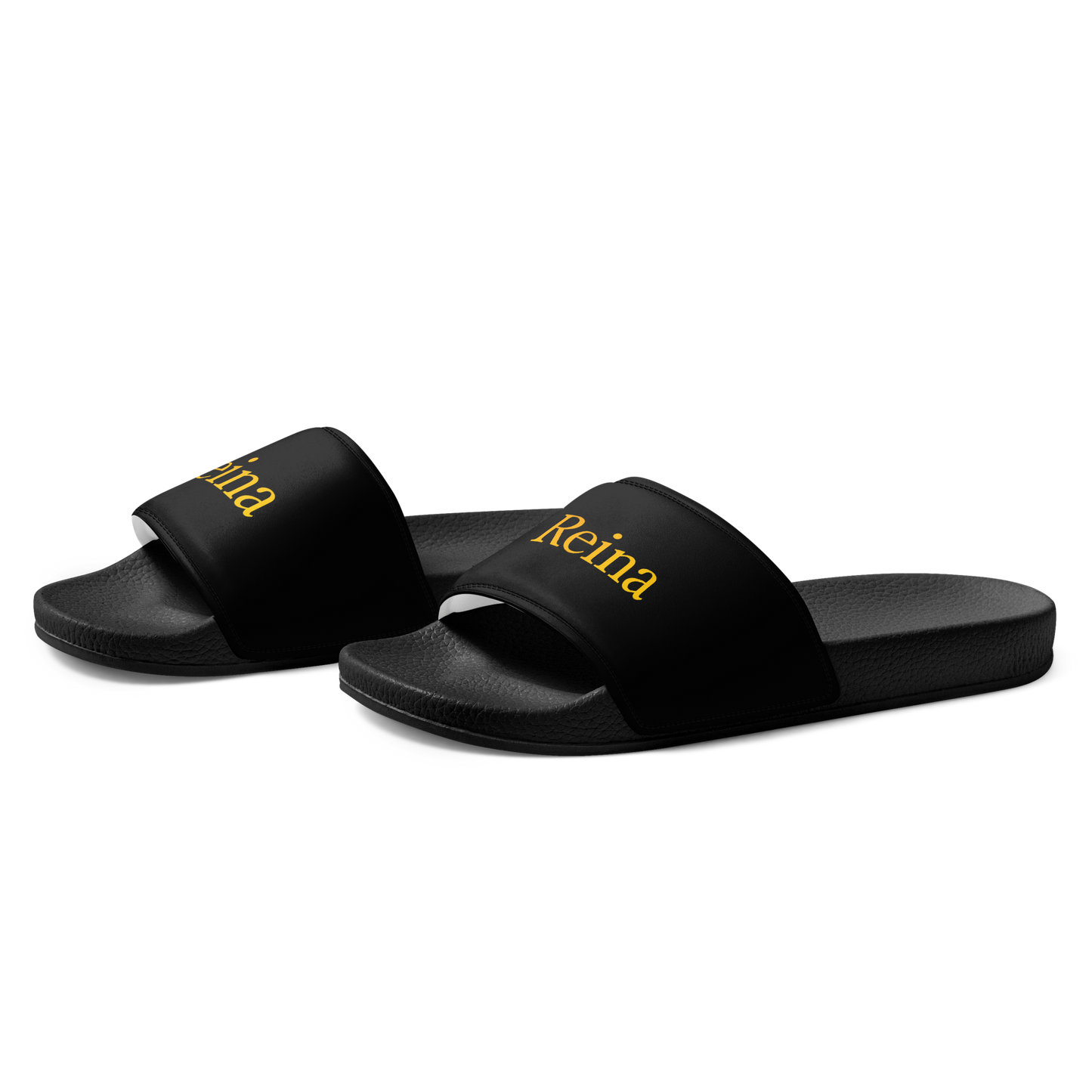 Reina black sandals with cushioned strap and contoured footbed.