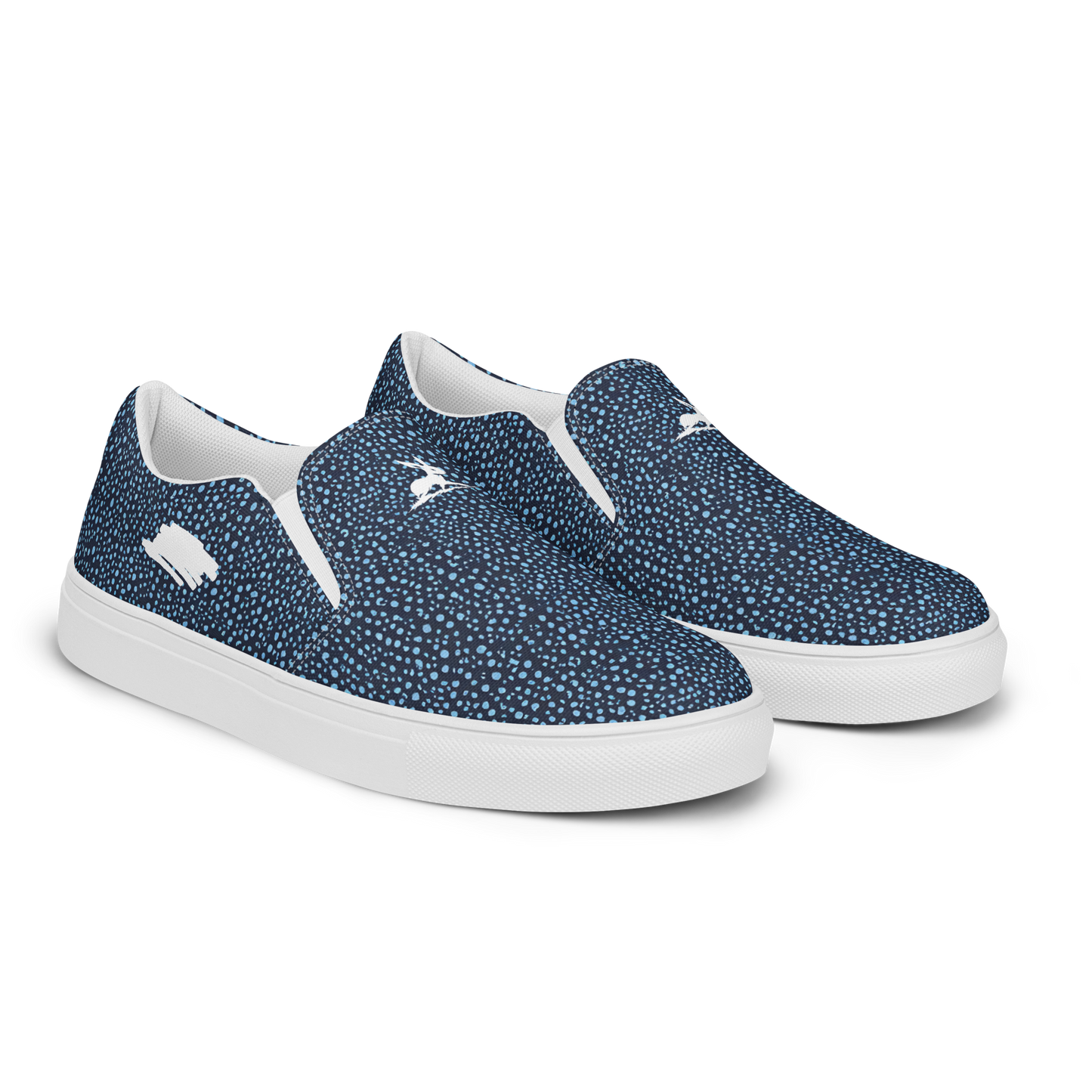 Blue Pebble Dash slip-on women’s canvas shoes with flexible soles, comfortable fit.