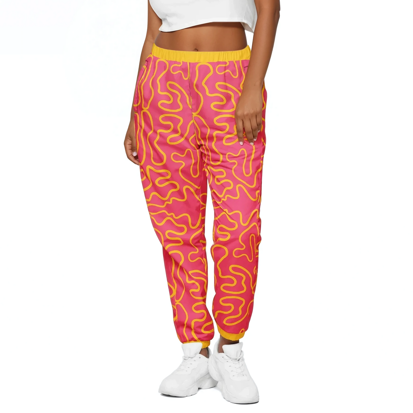 Wavy Line Track Pants with elastic cuffs, perfect for showcasing sneakers.