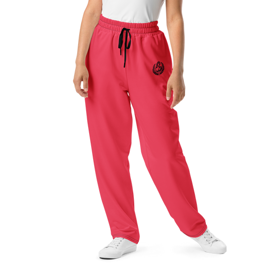 Loose-Fit Joggers with wide-leg, elastic waistband, and side pockets, displayed.