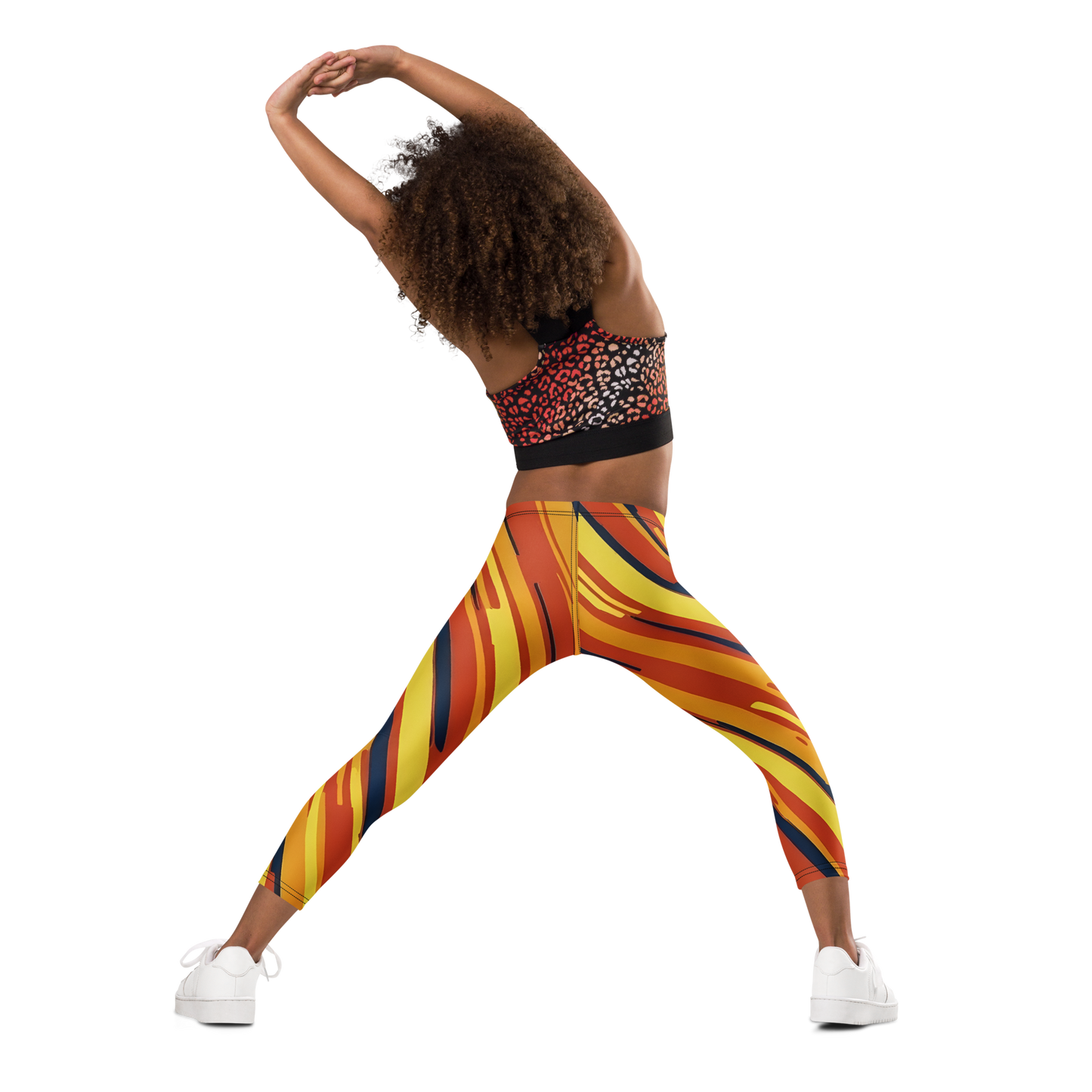 Close-up of hands holding Zip Zap Pants, emphasizing soft, stretchy fabric.