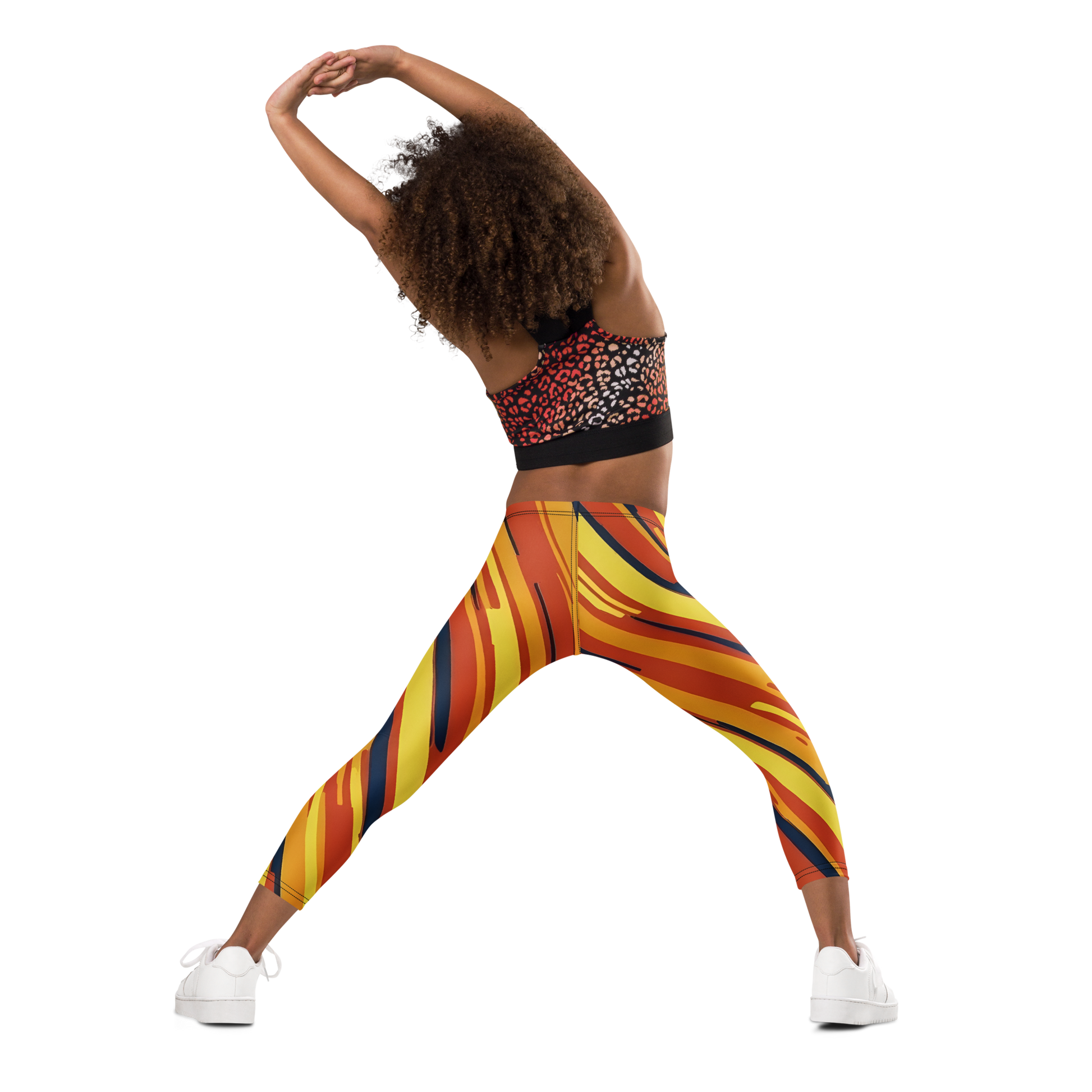 Close-up of hands holding Zip Zap Pants, emphasizing soft, stretchy fabric.