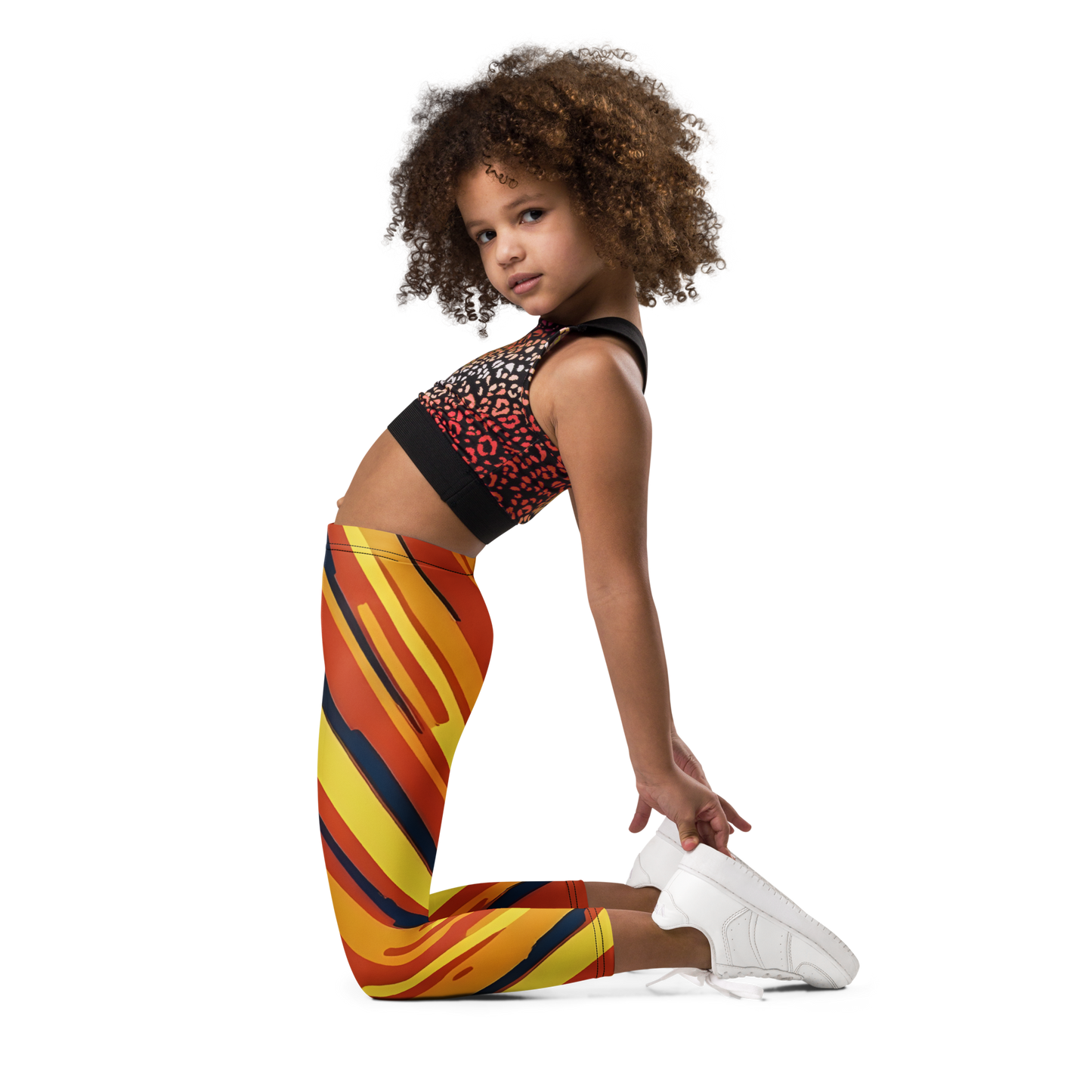 Zip Zap Pants: Close-up of girl's leggings with elastic waistband, vibrant prints.