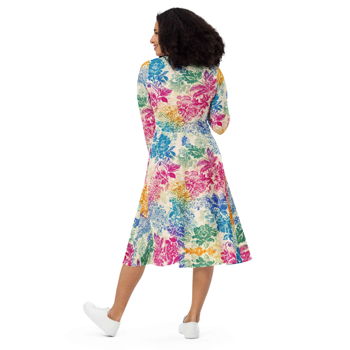 Fiesta Flora Dress: close-up of white shoe and person’s arm, showcasing elegance.