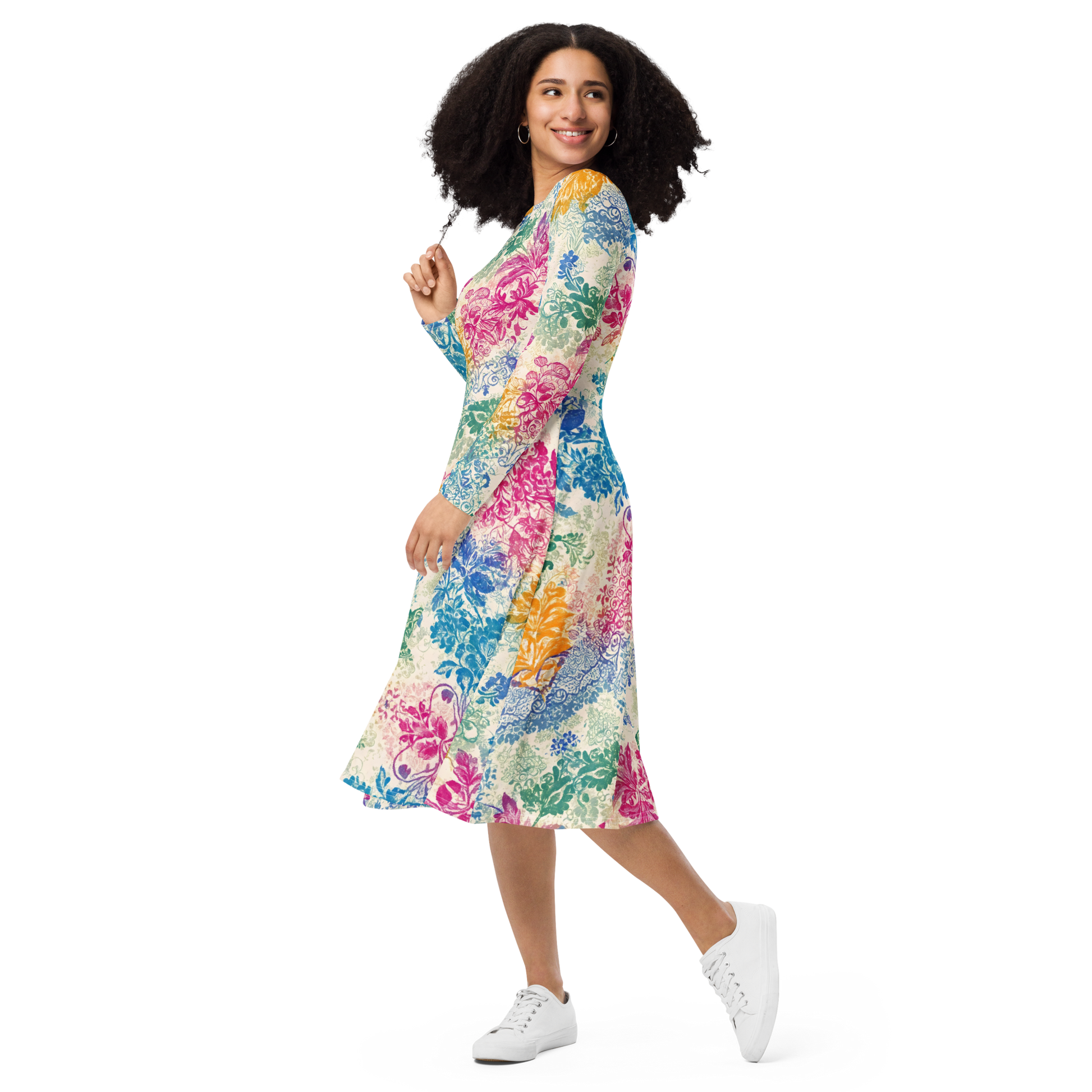 Fiesta Flora Dress showcasing a hand, white shoe, and smiling woman.