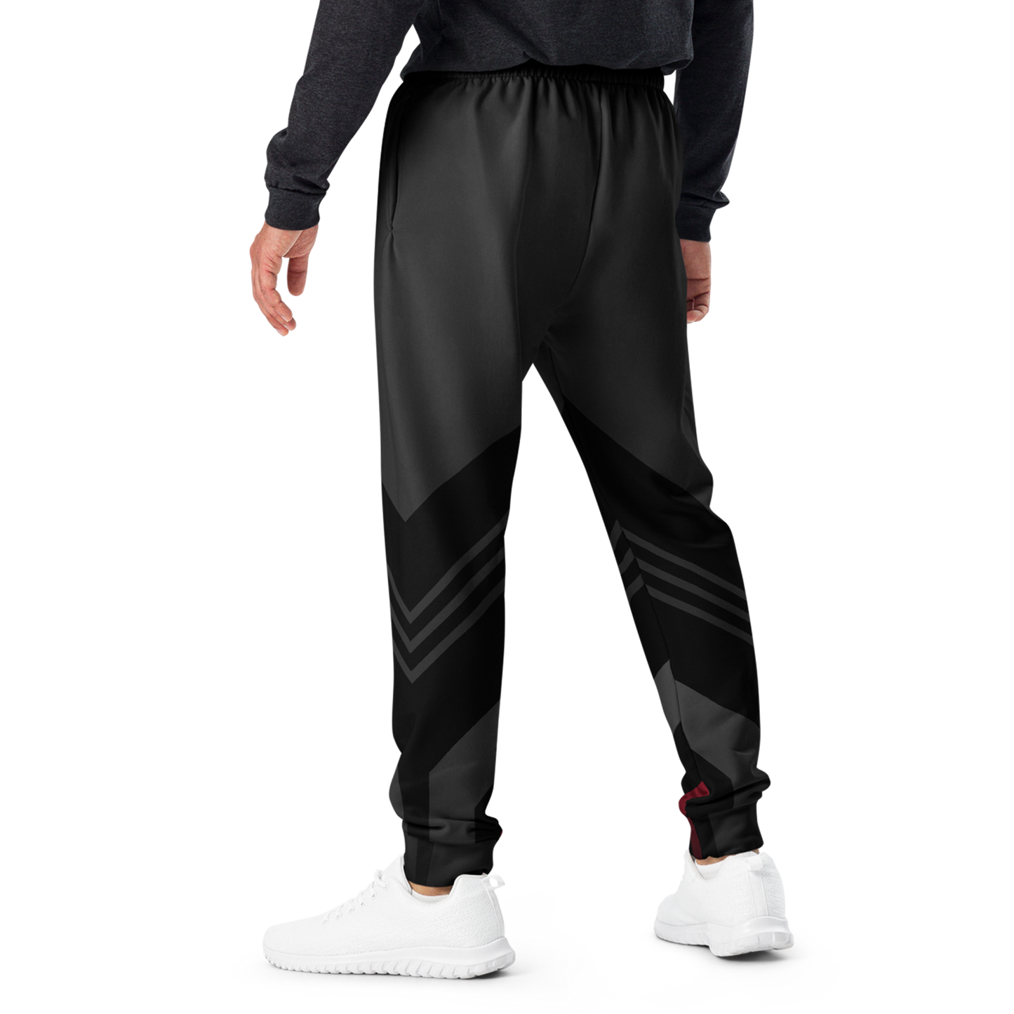 Men's Joggers with white shoes, highlighting slim fit and cuffed legs.