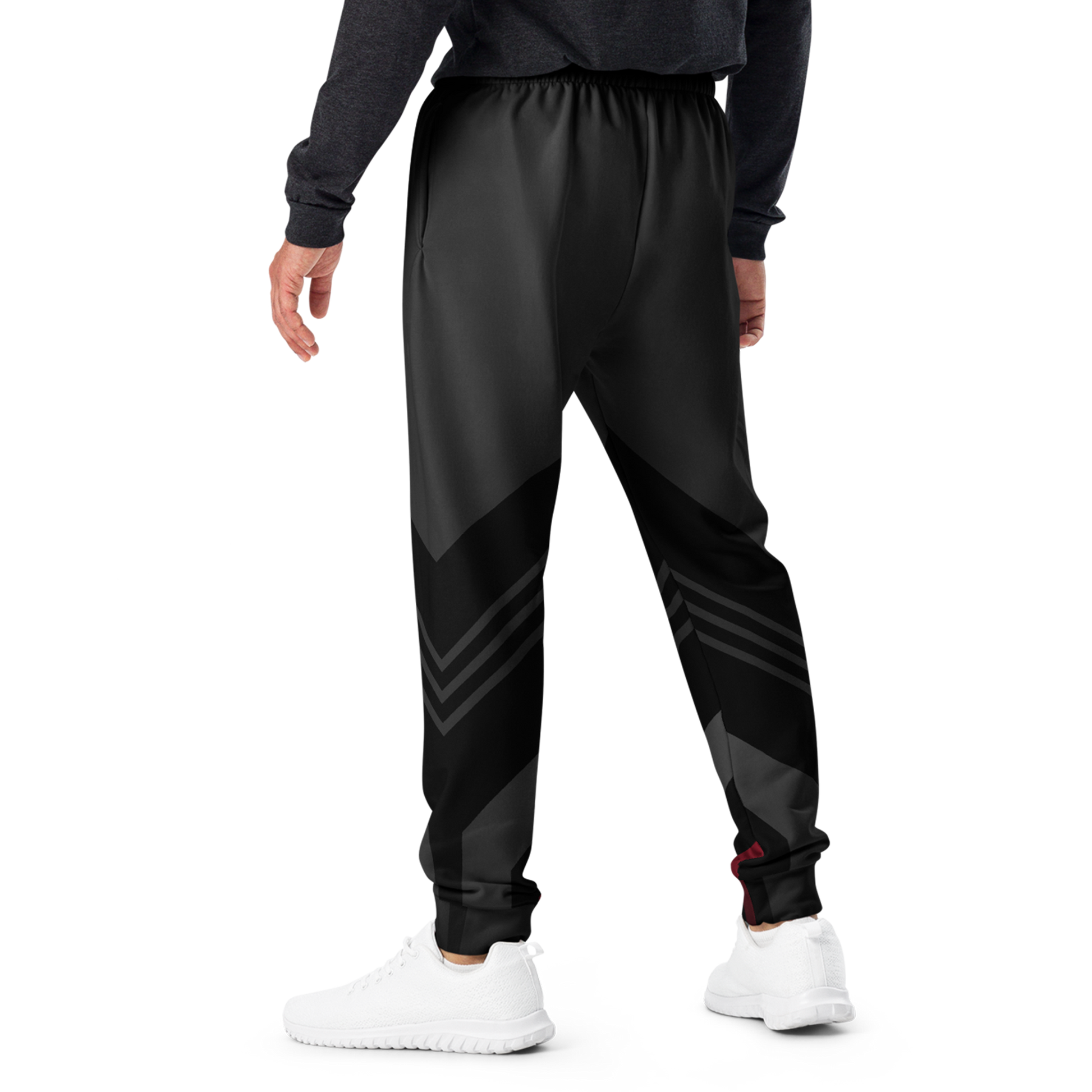 Men's Joggers with white shoes, highlighting slim fit and cuffed legs.