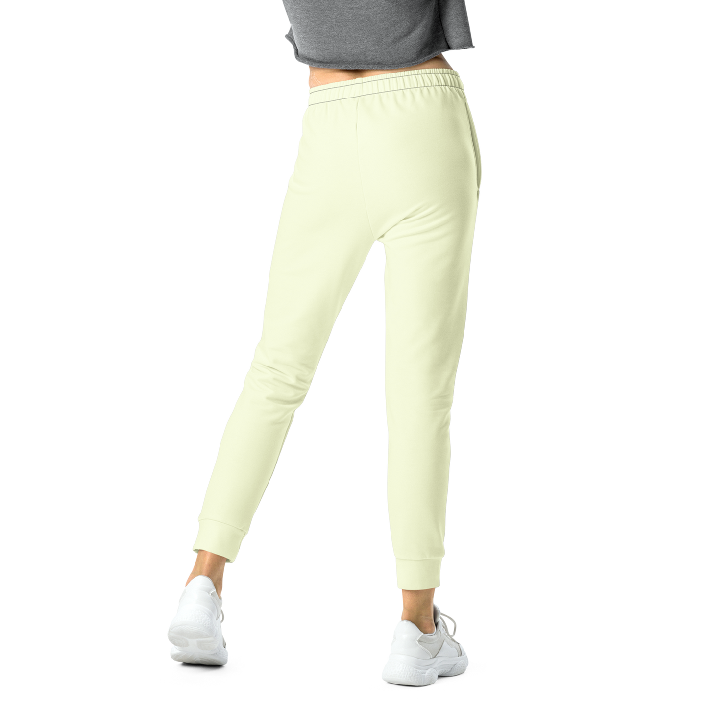 Cream Joggers with elastic waistband, practical pockets, and cuffed legs.