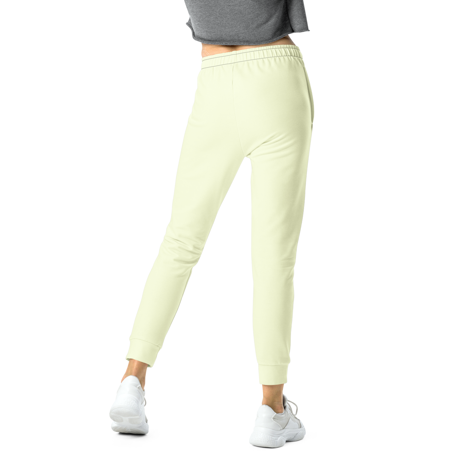 Cream Joggers with elastic waistband, practical pockets, and cuffed legs.