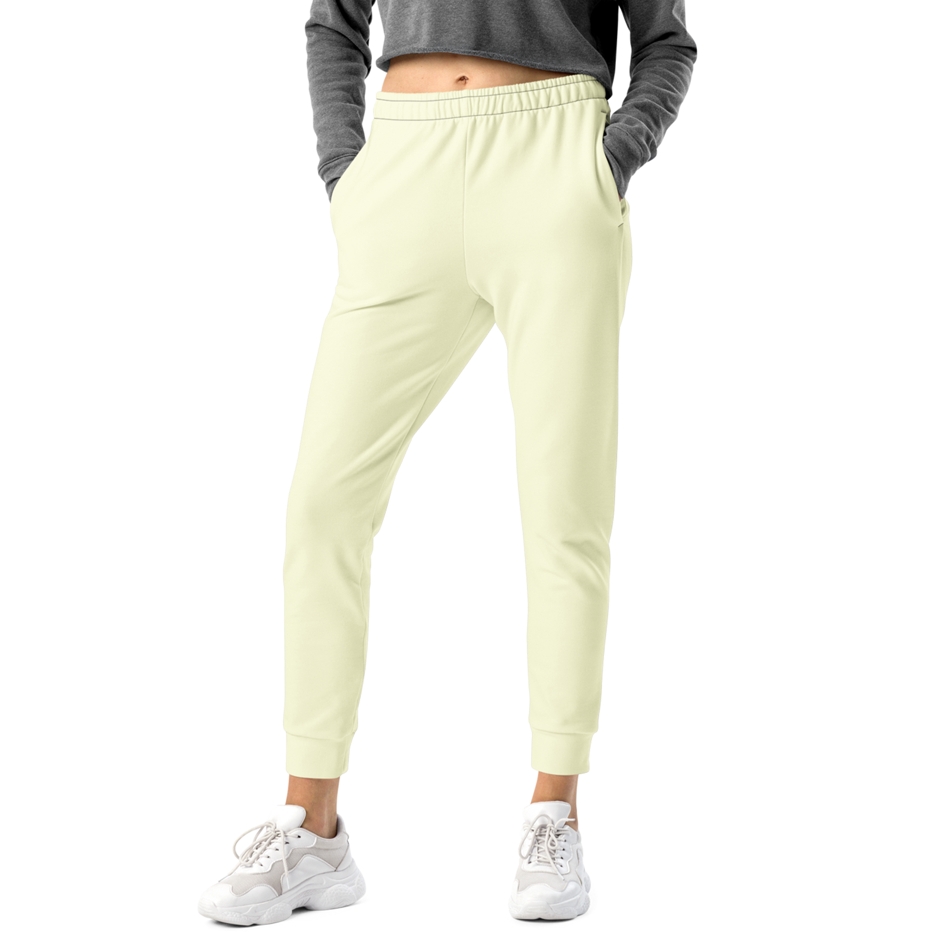 Cream Joggers close-up showcasing soft fabric texture and cuffed leg design.