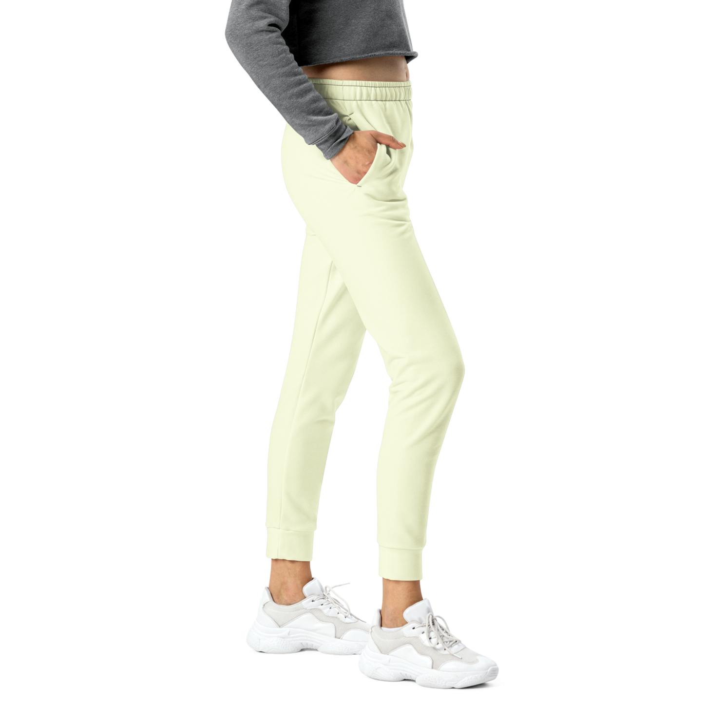 Cream Joggers close-up, showcasing soft fabric with practical pockets and cuffed legs.
