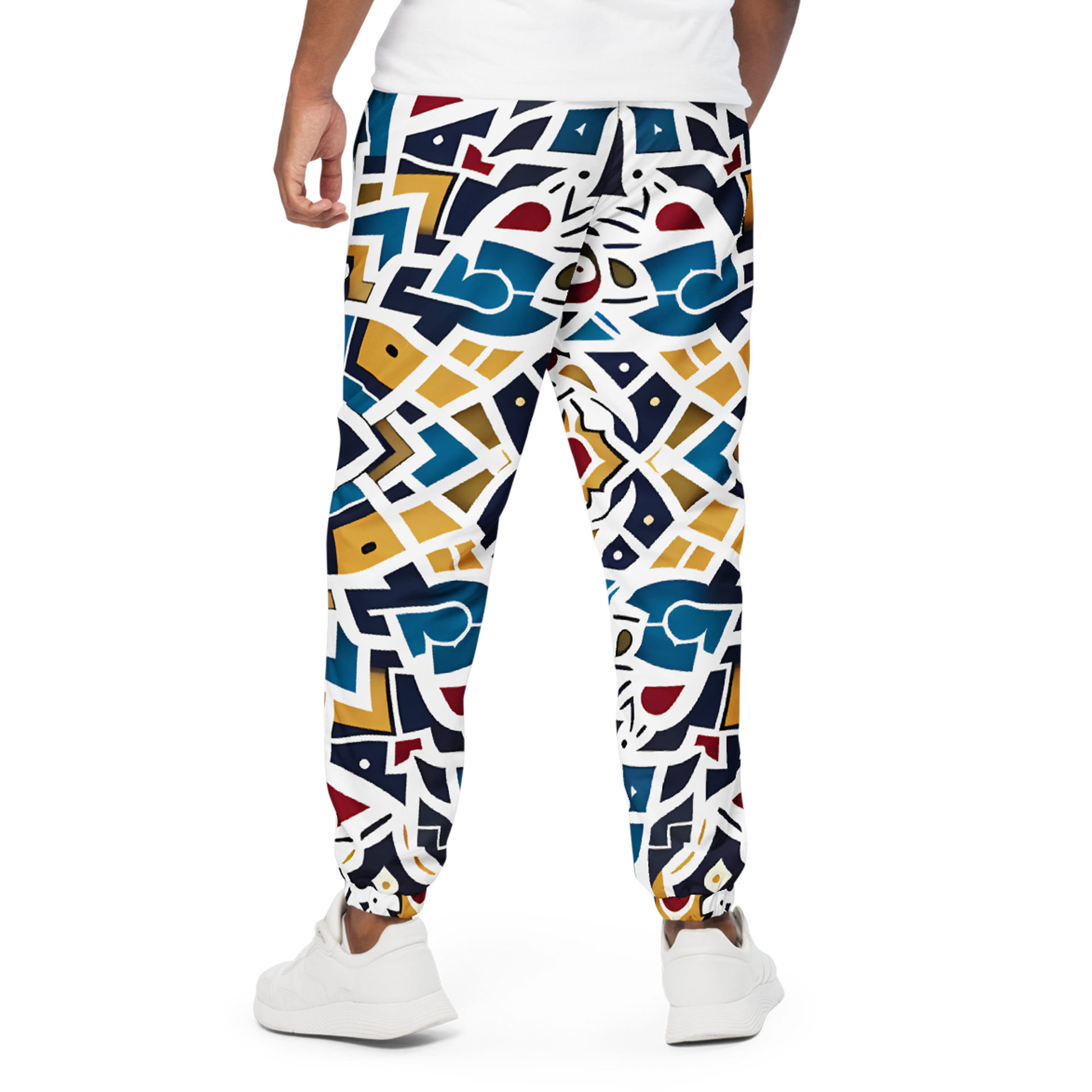 Spectra Shift Track Pants with colorful designs, showcasing mesh lining and elastic cuffs.