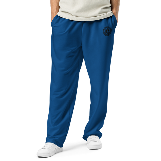 Loose-Fit Joggers close-up; wide-leg, smooth fabric, deep side pocket visible.