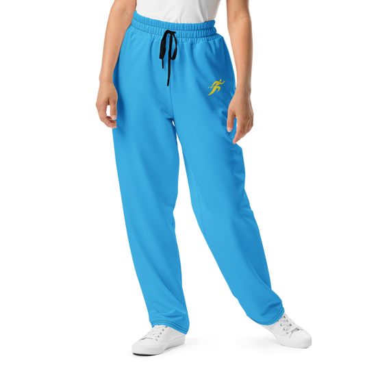 Close-up of Summer Flow Joggers worn with blue pants, showcasing wide-leg design.