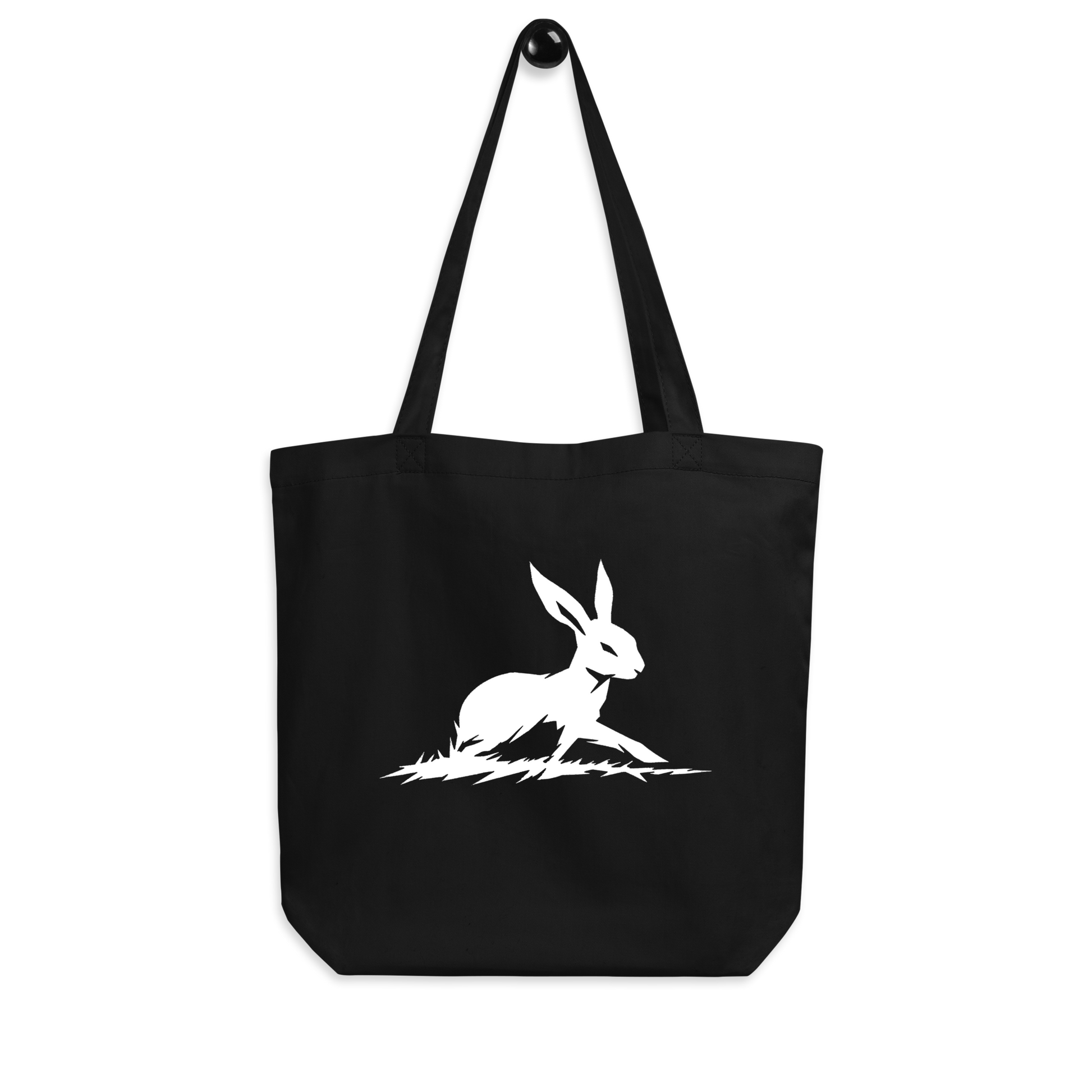 Keep Going, Keep Growing black tote with white rabbit design.