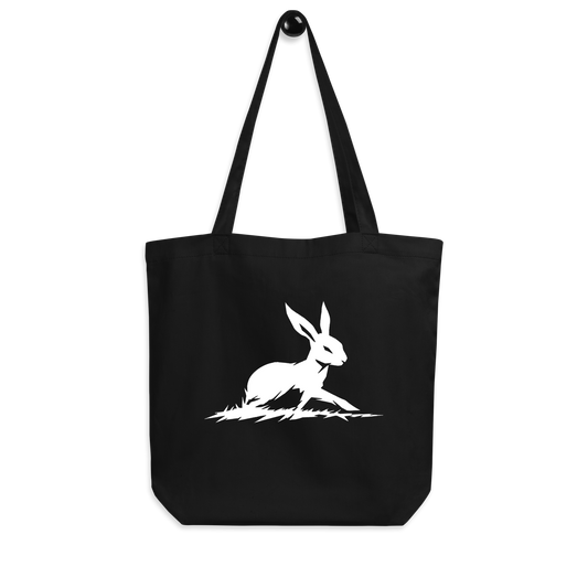 Keep Going, Keep Growing black tote with white rabbit design.