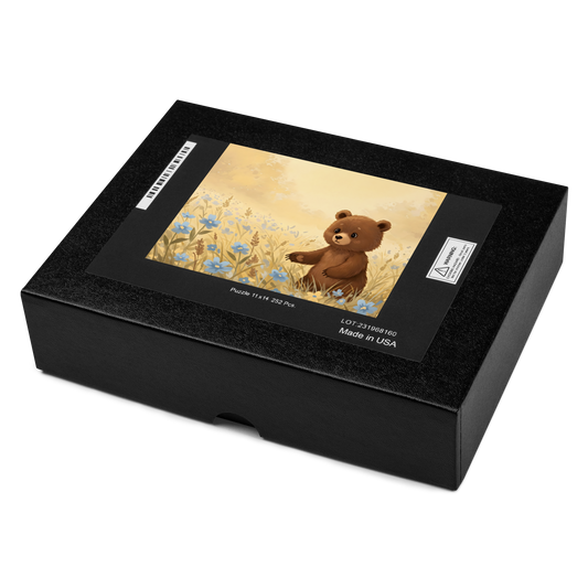 igsaw puzzle box featuring a brown bear, with a separate close-up card of the bear.