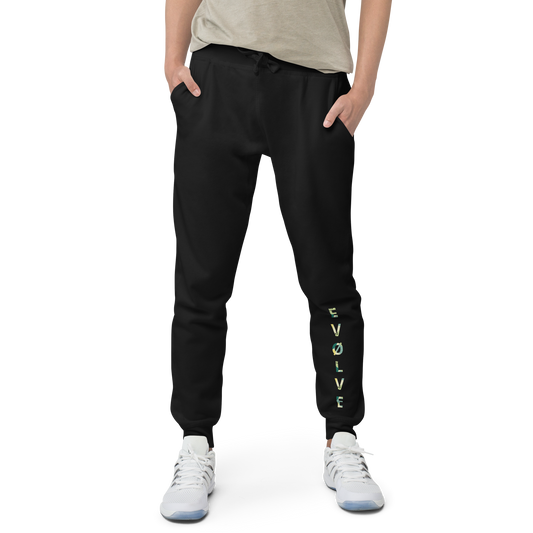 EVØLVE fleece sweatpants with text, close-up of stitching and cuffed legs.