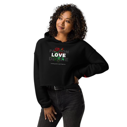 Woman with curly hair wearing Sweet Fragrance Hoodie, showcasing cropped fit and raw hem.
