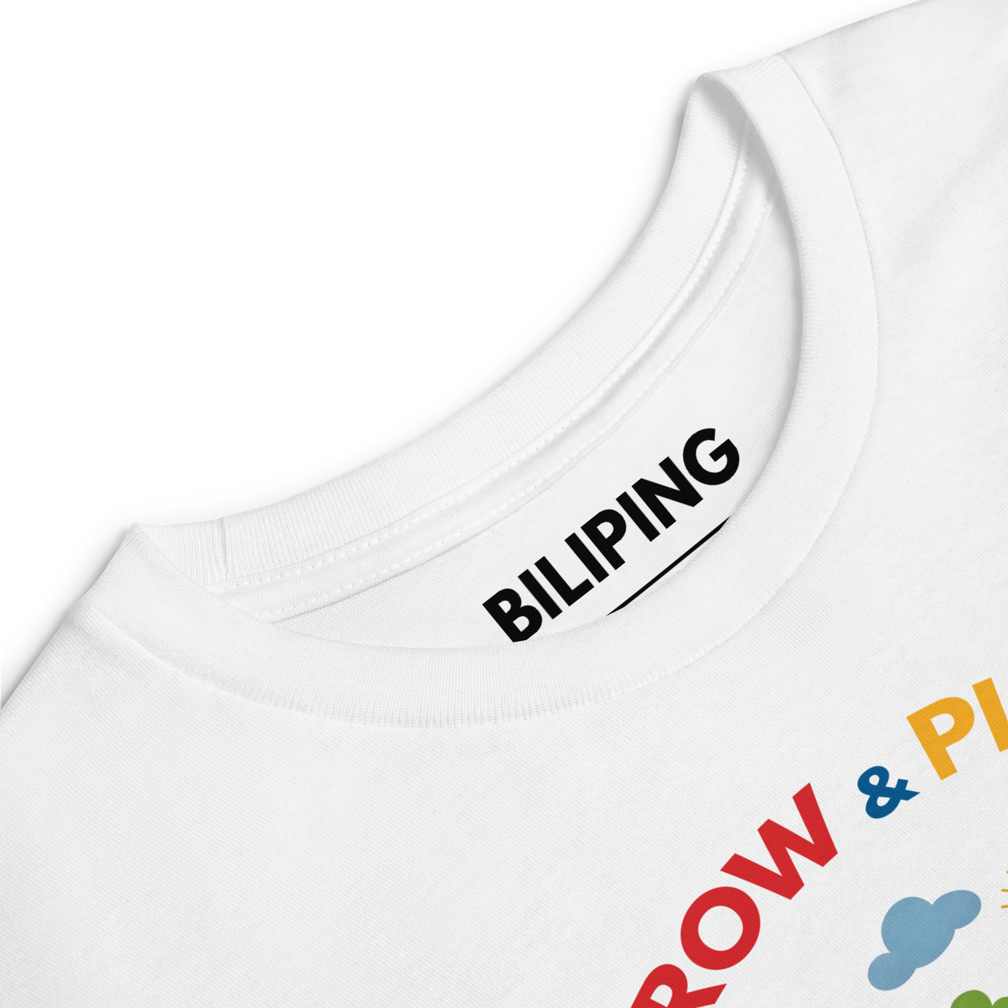 Grow & Play Tee close-up showcasing logo on soft white fabric.